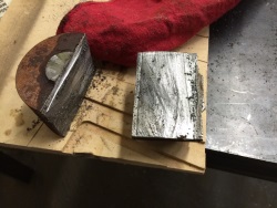 Steel round cut in half.
